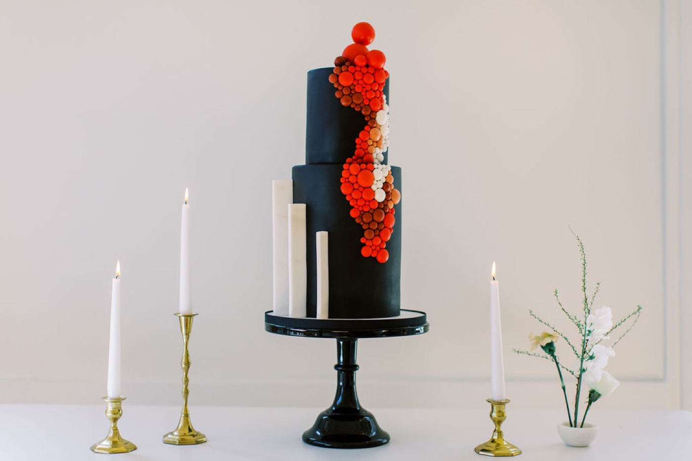 Modern black and red wedding cake by Sweet Fix
